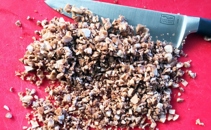 Finely chop the mushroom stems and gills.