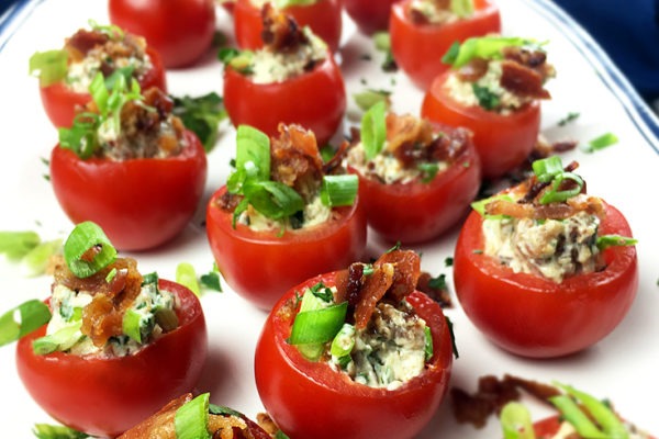 Stuffed Cherry Tomatoes, aka BLT Bites, are filled with a delicious mayonnaise cream cheese filling with lots of bacon and sharp asiago cheese. It's the perfect appetizer for summer because it is easy to prepare and you serve it cold, so there is no need to turn on the oven. If you need a great recipe idea for your next party, this one is the best!